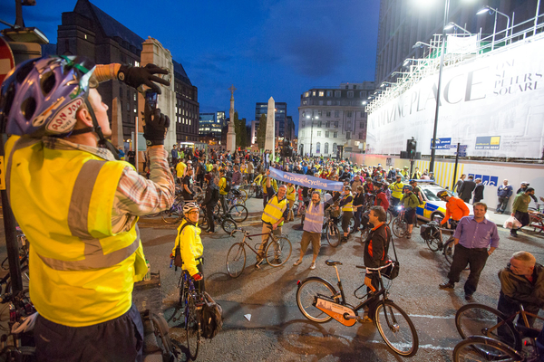 Manchester's #space4cycling ride ended back in St Peter's Square, cue banners, photos, bike lifts etc.
